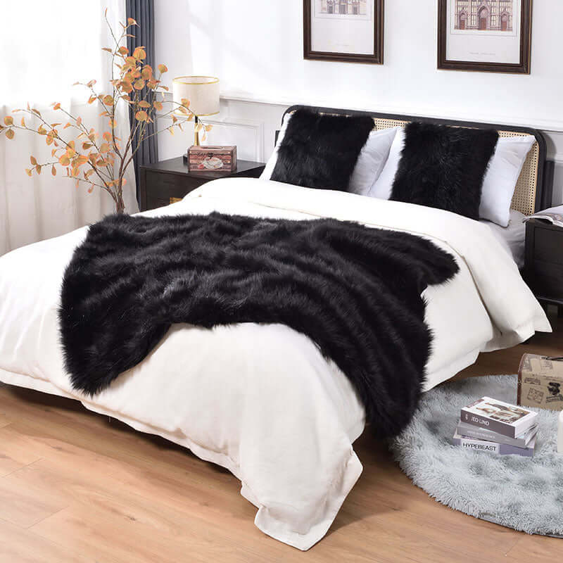 The small size 100% cruelty-free black faux fur blanket is great for both decoration and keeping warm. It's easy to wash and extremely soft.