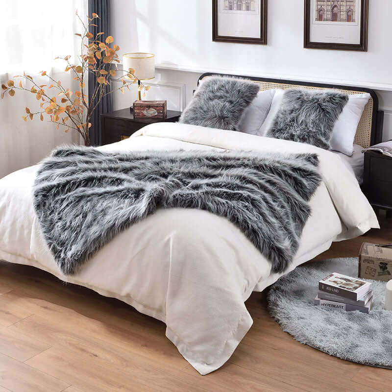 A small size fluffy grey faux fur blanket, which is multi-functional and easy to wash. Suitable for keeping warm and decorating rooms.